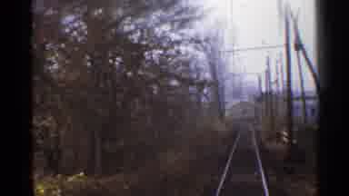 Connecticut USA (1953): Traveling Down Train tracks Through A Wooded Area During