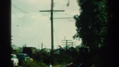 Connecticut USA (1953): Red Train Sails Down The Tracks Towards The Camera As It
