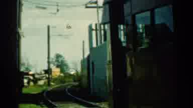 Connecticut USA (1953): Brown Trolley Car Rolling On Tracks On A Sunny Day