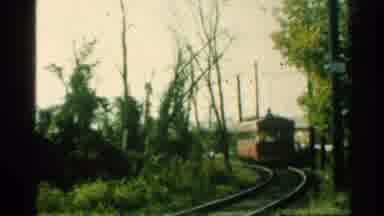 Connecticut USA (1953): A Single Red Cart Of An Old Fashioned Train Driving Along