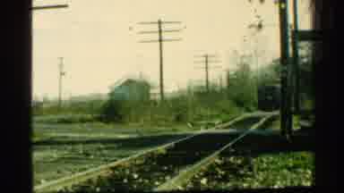 Connecticut USA (1953): Train In The Country Slowly Approaching Intersection On A