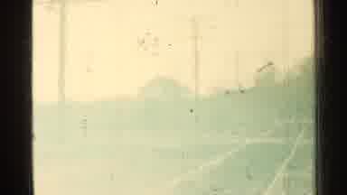 Connecticut USA (1953): Tracks And Small Town From Slow Moving Train