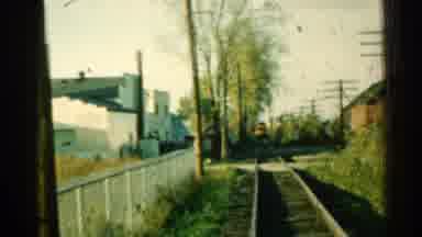 Connecticut USA (1953): A Train Seen In The Distance Slowly Rolling Down The