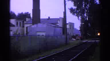 Connecticut USA (1953): Archive Yellow Train Driving On The Train Tracks Near