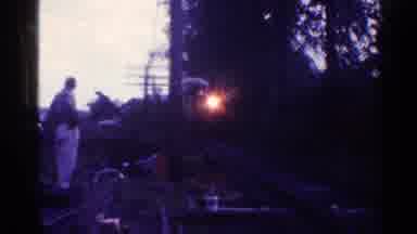 Connecticut USA (1953): Man Waiting For Train On The Side Of The Train Tracks