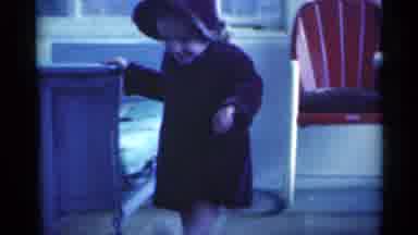 Michigan USA (1939): Vintage Baby In Sunday Best Kicking Her Feet