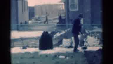 Michigan USA (1939): A Guy Standing Outside In His Garden Doing A Bunch Of Hard