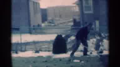 Michigan USA (1939): Home Movie Of Man Shoveling Dirt In Front Of A House