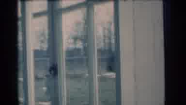 Michigan USA (1939): Man Hammers Something Into The Ground Which May Be Frozen