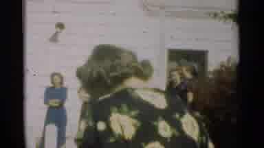 New Orleans Lousiana (1949): People Standing Talking Outside White House While