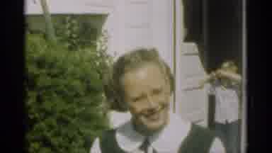 New Orleans Lousiana (1949): Boy Wearing White Shirt Shields Eyes From Sun On A