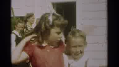 New Orleans Lousiana (1949): A Girl In Ringlets Bows And A Red Dress Waves Her