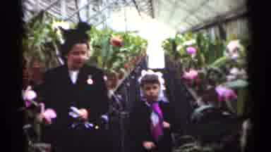 New Orleans Lousiana (1949): A Woman A Female Child Are Looking At Spring Blossoms