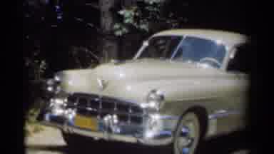 New Orleans Lousiana (1949): Old Beige Colored Buick Automobile Shining Under The