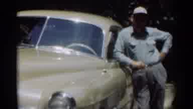 New Orleans Lousiana (1949): A Man Leans On A Yellow Car While A Woman In A Blue