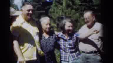 New Orleans Lousiana (1949): Man Wearing Yellow Shirt Points At Object On A Sunny