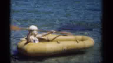 New Orleans Lousiana (1949): There Is A Person Paddling In A Raft On The Water