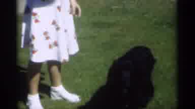 New Orleans Lousiana (1949): Girl Giving Dog A Cookie As Reward And Taming