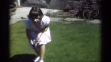 New Orleans Lousiana (1949): Young Lady Outside Enjoying The Sun Playing Wit