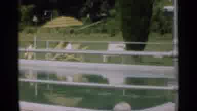 Santa Cruz California (1949): A Sunny Day And Two People Enjoy The Sun By The Pool