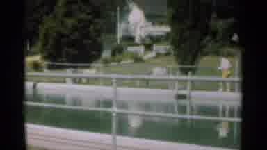 Santa Cruz California (1949): A Man Walks A Very Large Artificial pond In Front Of