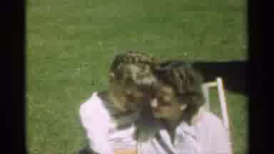 Santa Cruz California (1949): The Mother Hugs Daughter As Daughter Yawns And Makes