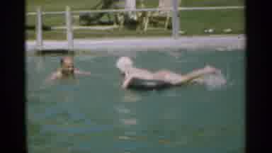 Santa Cruz California (1949): Father With Daughter At Public Pool Swimming On