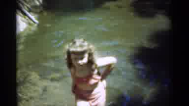 Santa Cruz California (1949): Little Girl Out With Grandfather Playing In River In