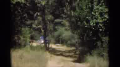 Santa Cruz California (1949): A Woman And A Child Are Walking Down A Dirt Road