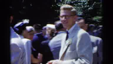 New York USA-1954: Tense Interaction at Formal Outdoor Gathering