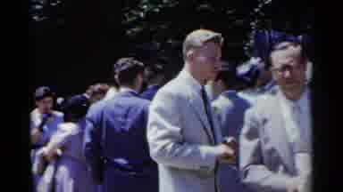 New York USA (1954): White People Dressed In Suits And Hats Posing For A Photo