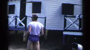New York USA (1954): A Boy In A White Shirt Rubbing The Front Of His Face