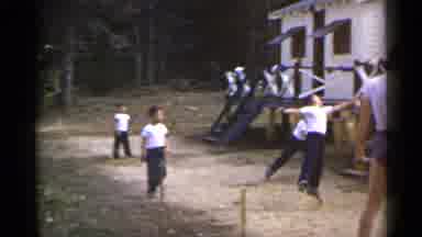 New York USA (1954): White Dressed Guys Playing In Front Of White Houses In
