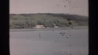New York USA (1954): People At A Lake For Holiday And Boats On The Water
