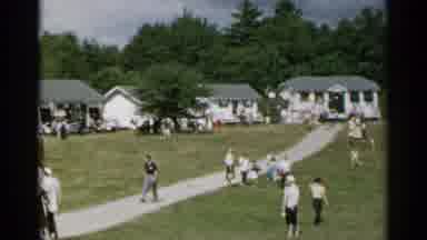 New York USA (1954): A Group Of People Walking Around Some Buildings As A Couple