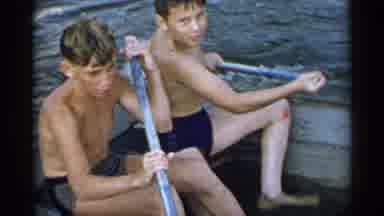 New York USA (1954): Two Young Boys In Small Boat With Water In The Bottom