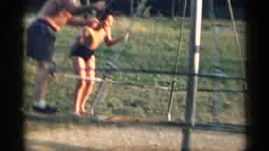 New York USA (1954): Old Playground Merry-Go-Round Called A Witches Hat With Men
