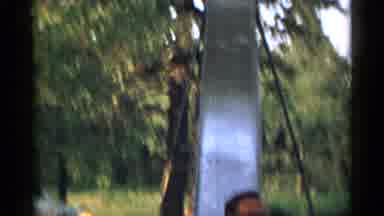 New York USA (1954): Two Cults Having Fun On A Slide That Is Attached To An Old