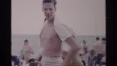 New York USA (1954): Young Men On A Beach Gather Towels And Dry Their Hands