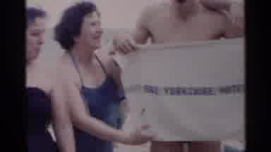 New York USA (1954): People Enjoying Themselves At The Beach With Swimming Suits