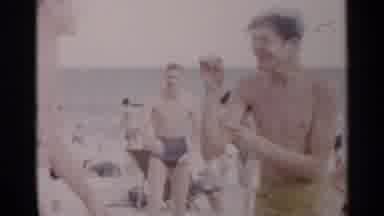 New York USA (1954): People In Vacation On The Beach Enjoying Each Other