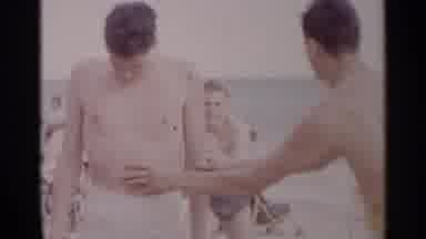 New York USA (1954): Two Boys Playing On The Beach In Underwear With A Lot Of