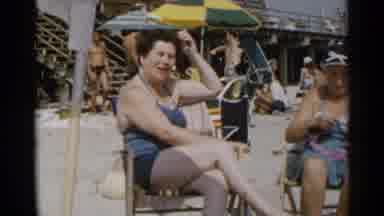 New York USA (1954): Two Romans And Three Young Boys At Sea Side Taking Sunbath