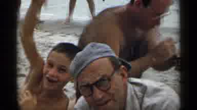 New York USA (1954): Happy Family On The Beach Wearing Swimming Suits And Glasses
