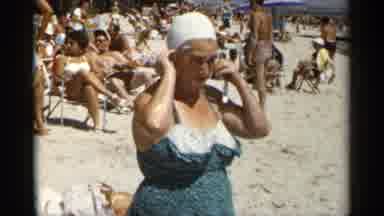 New York USA (1954): Woman Getting Out Of Water And Taking Off Swimming Cap