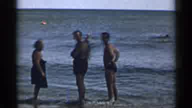 New York USA (1954): People Enjoying Their Family Vacation At The Beach
