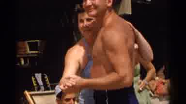 New York USA (1954): Young Man Dancing In Bathing Shorts With Lady