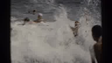 New York USA (1954): Groups Of People And Kids Playing In The Medium Sized Waves