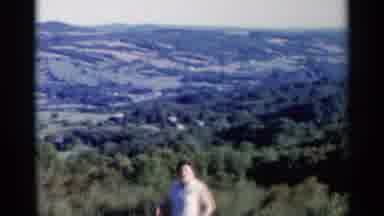Lake George New York (1955): Valley Between Hills With Happy Person Waving In