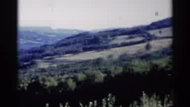 Lake George New York (1955): Green Trees And Hills On A Bright Sunny Day